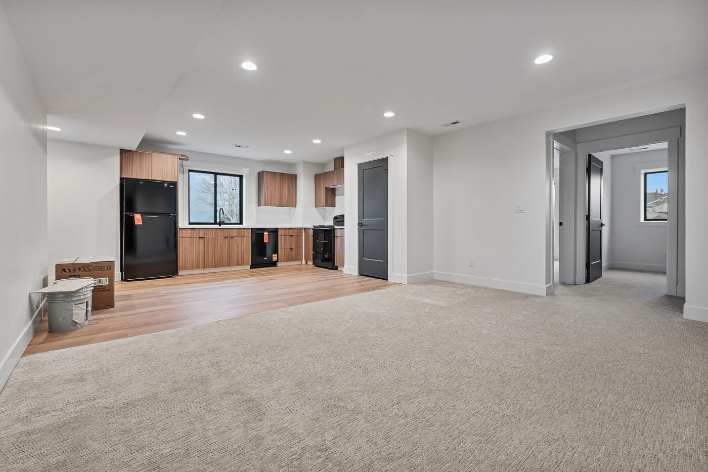 Basement guest suite with private kitchen, living area, and own entrance — 560 Partridge Lane Rexburg in-law suite